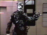 One of the Borg who abducted Picard from the bridge of the Enterprise - uncredited